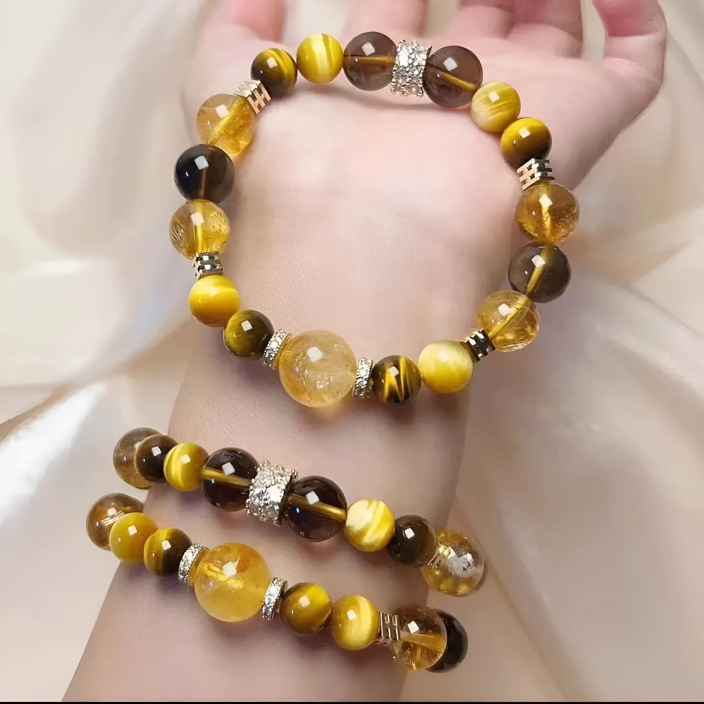 Yellow artificial crystal beaded bracelet with 10mm tower-shaped beads on wrist
