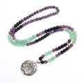 Yoga lotus pendant necklace with handmade stone beads and matching bracelet on adjustable chain.