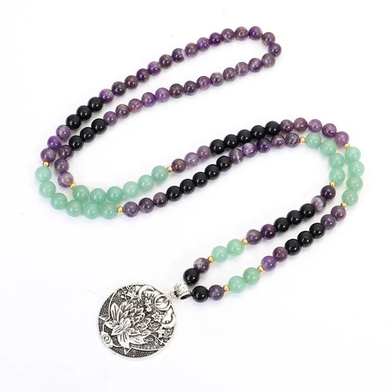 Yoga lotus pendant necklace with handmade stone beads and matching bracelet on adjustable chain.