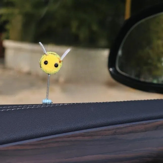 Swing Spring Bee car dashboard decoration showing cartoon bee design on fur ball material