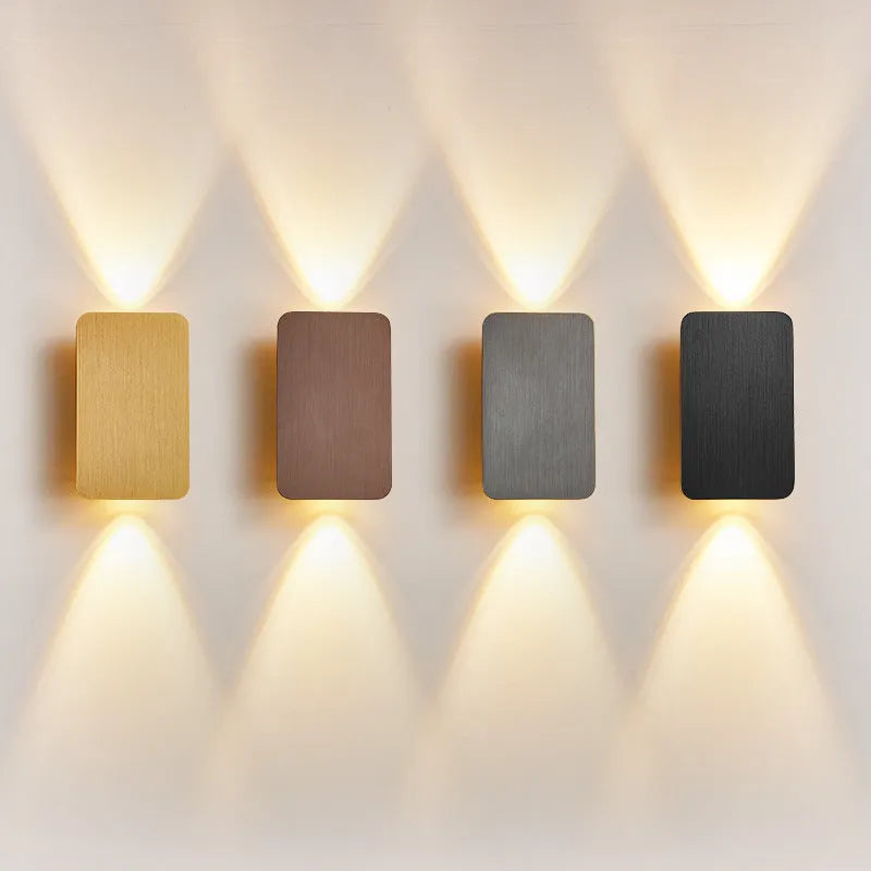 Minimalist Nordic style LED wall lamp in black finish mounted on wall showing adjustable light feature