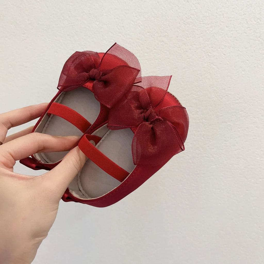 Princess toddler soft bottom pumps in festive red with bow pattern real silk upper elastic band closure