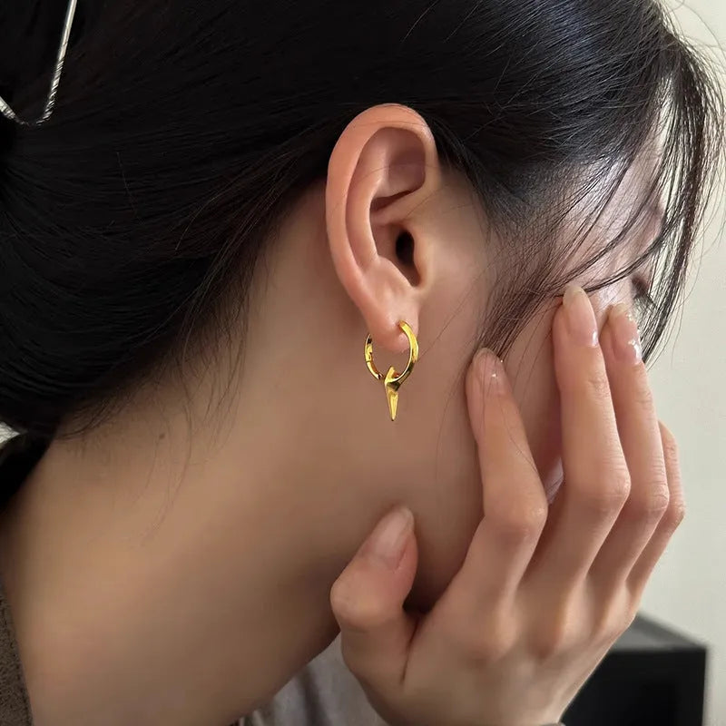Geometric star shaped ear clips for women with electroplated copper construction and white gold plating