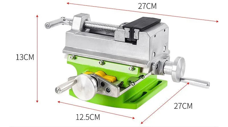 Bench drilling machine with cross bench pliers on workbench