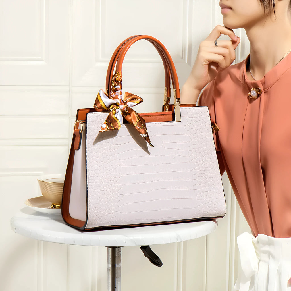 Milky white PU shoulder handbag with horizontal square shape and internal organisational compartments