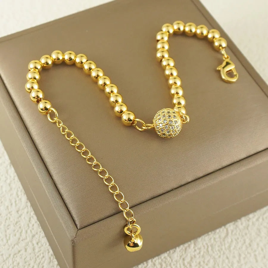Copper bracelet with zircon stones in Arabic style design featuring heart shape details
