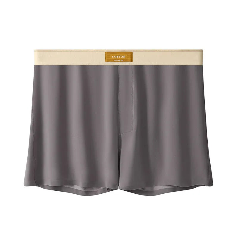 Men's loose fit ice silk underwear in solid colours showing mid-waist design and breathable fabric texture.