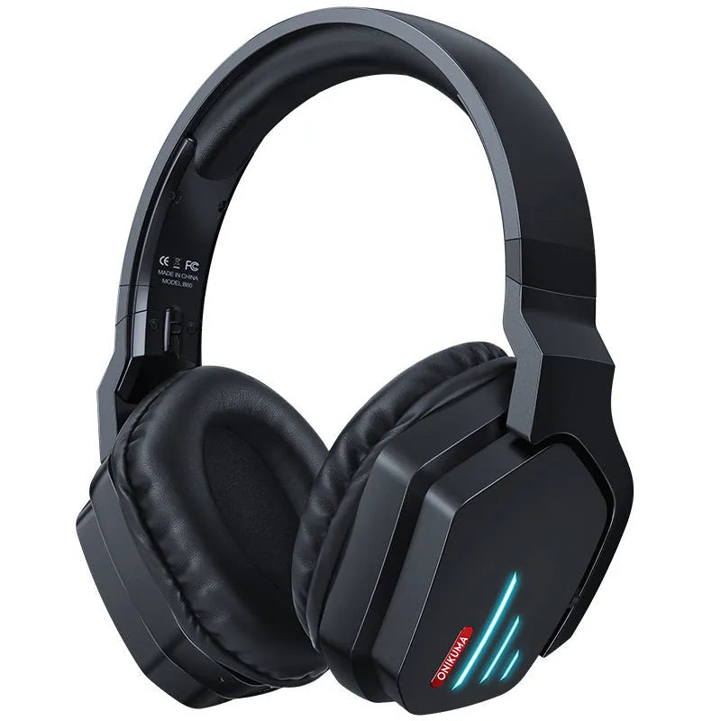 Luminous black wireless gaming headphones showing head-mounted design and included 3.5mm cable.