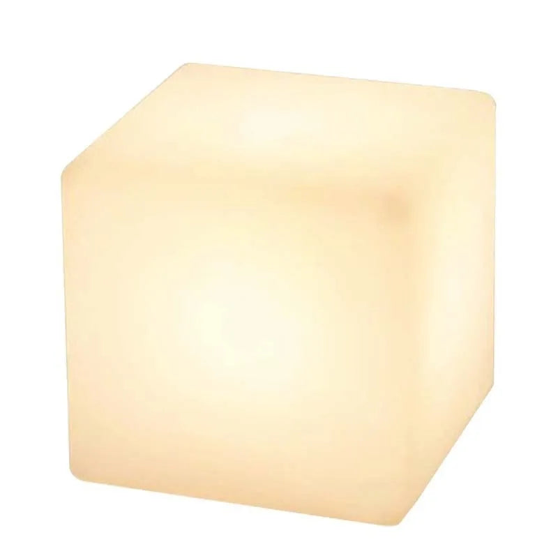Modern white LED square cube light for outdoor garden and pathway illumination.