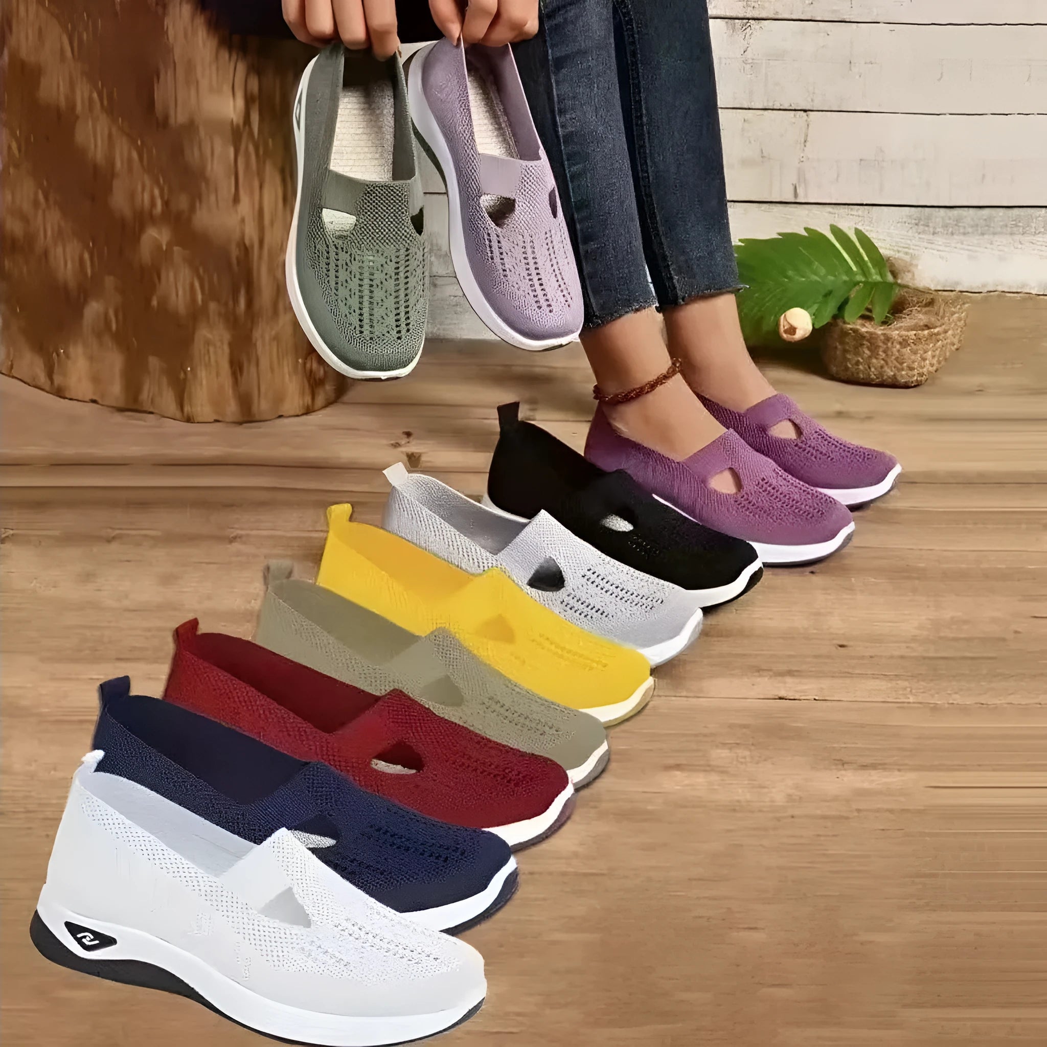 Elderly woman's black mesh T-strap shoe with soft PVC sole and round toe