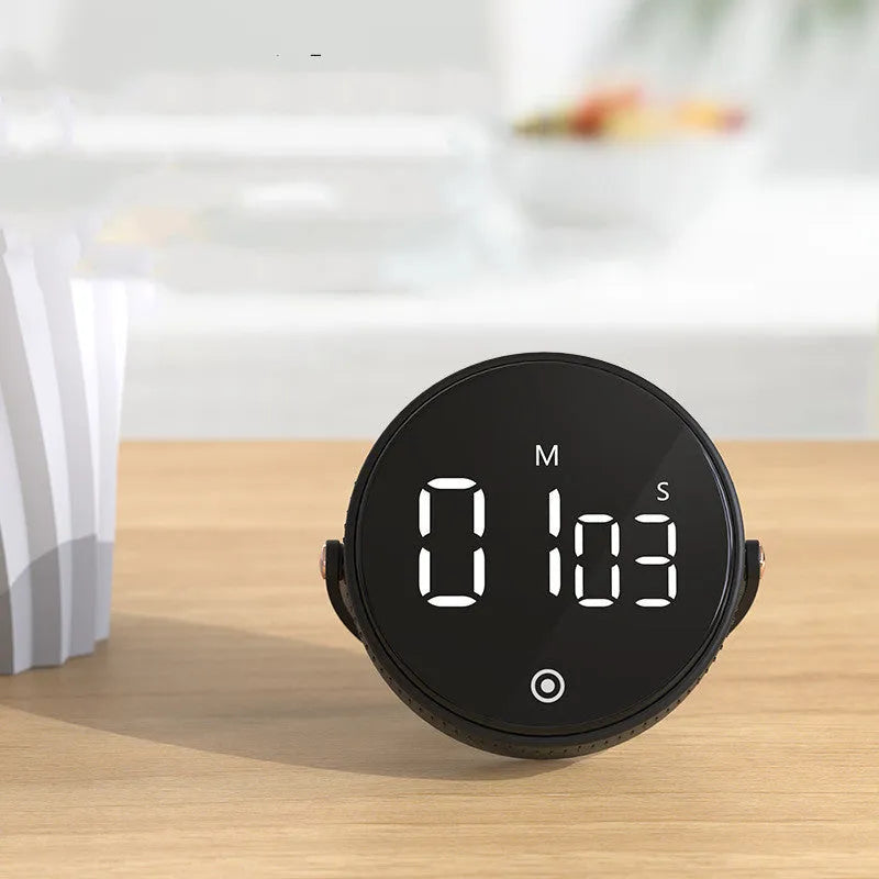 Kitchen silent rotary adjustable digital timer with LED display, black, showing rotary dial and countdown