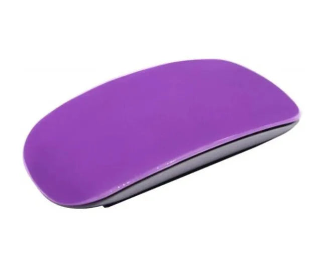 Silicone mouse cover for Apple Magic Mouse in white, showing textured surface and snug fit