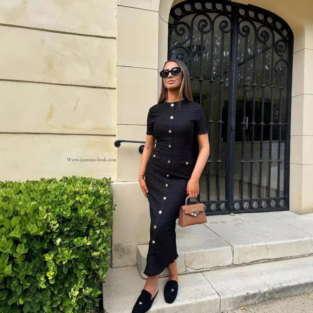 French retro slim fit knitted dress with long sleeves and button details in black colour