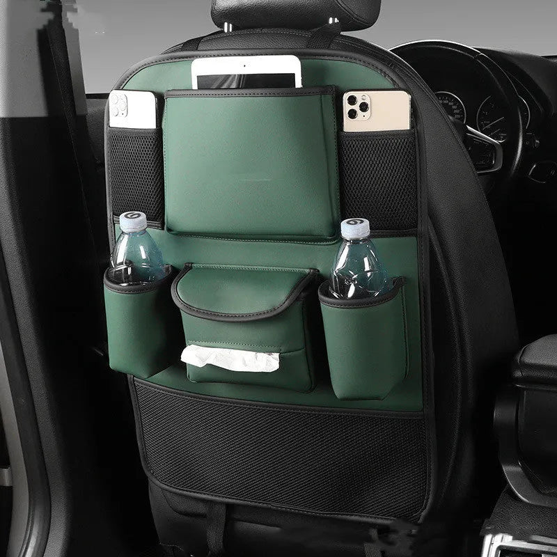 Genuine leather car seat back storage bag shown in grey, suspended behind a car headrest.