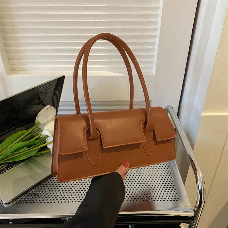 Women's small square shoulder bag in PU leather with horizontal rectangle shape and stitching detail