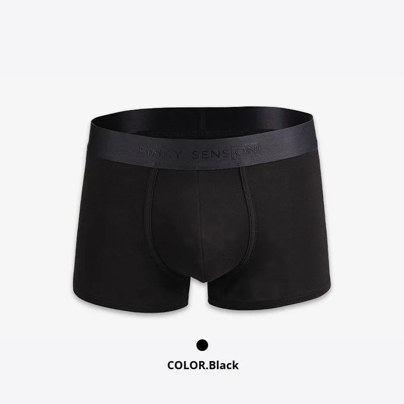 Men's solid colour cotton boxer shorts showing available black, white, silver grey, and light green options