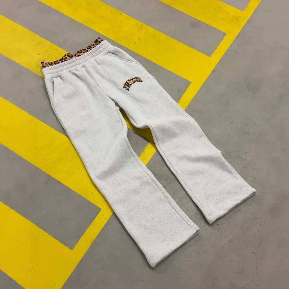 Men's patchwork double waist hip hop trousers in loose fit with elastic fabric and zip fly