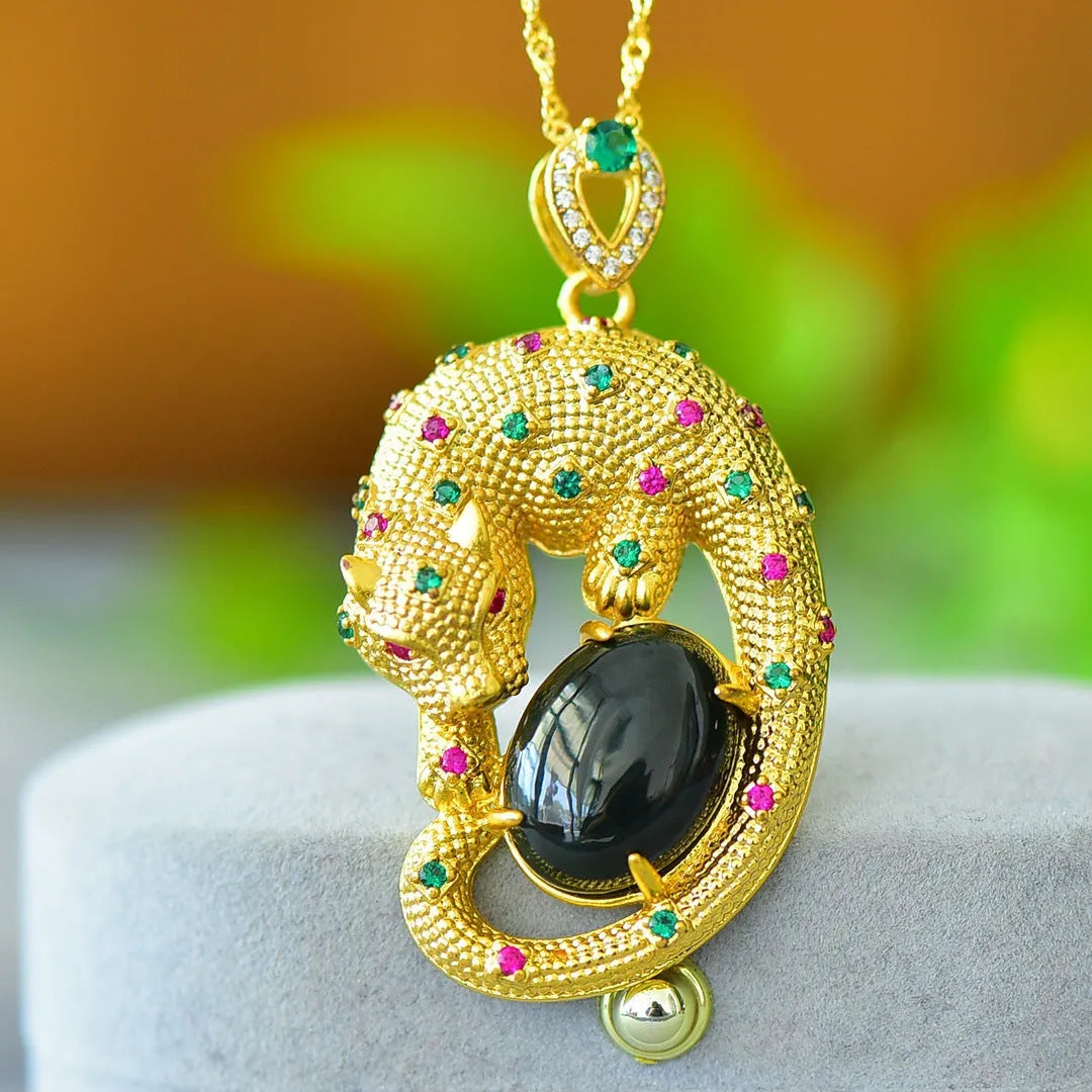 Flat geometric Hetian jade pendant with copper inlay on a necklace chain.