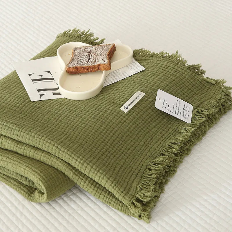 Four-layer gauze cotton blanket with tassel trim in navy blue colour