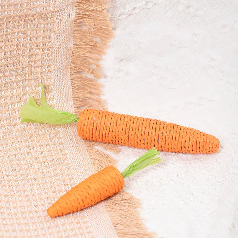 Set of cat toys including carrot bites, paper balls, ringing stones sticks, and dental chewing sticks in large and small sizes