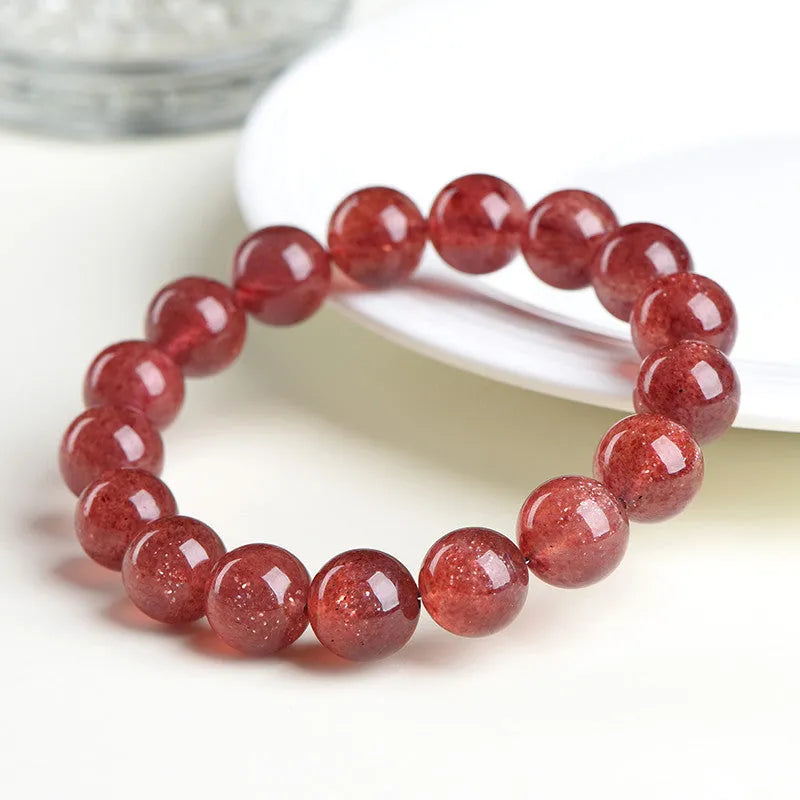 Natural starlight cherry red strawberry quartz bracelet with geometry-shaped beads in crystal material