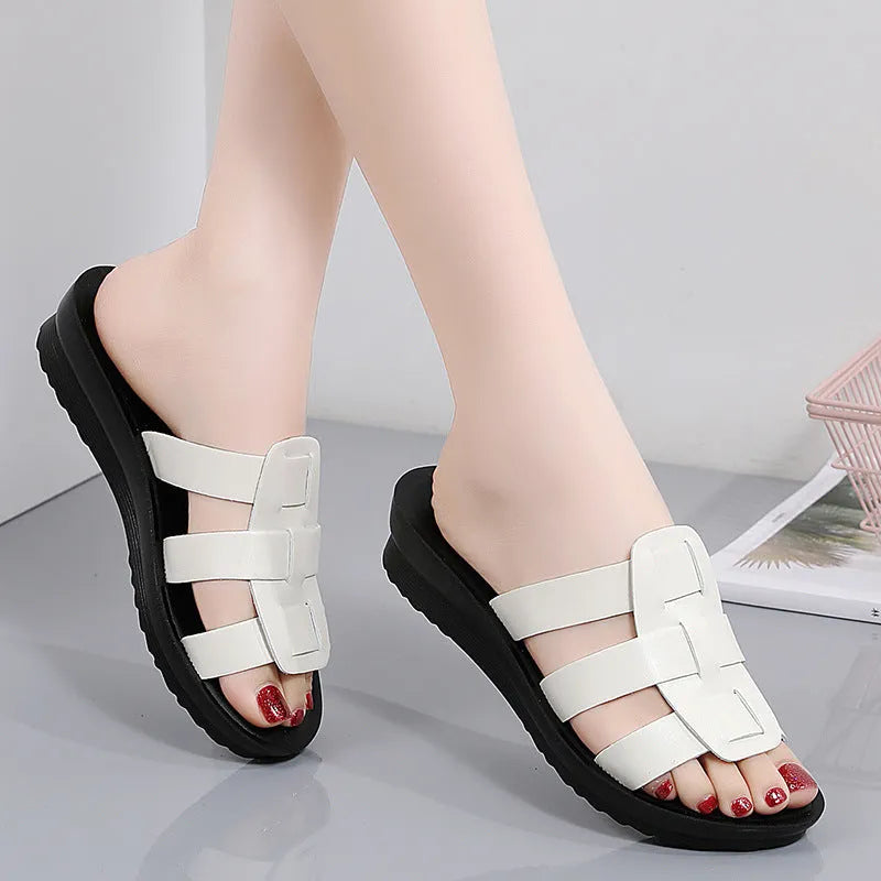 Women's flat bottom slippers in beige, black, and brown with viscose upper and non-slip PU sole