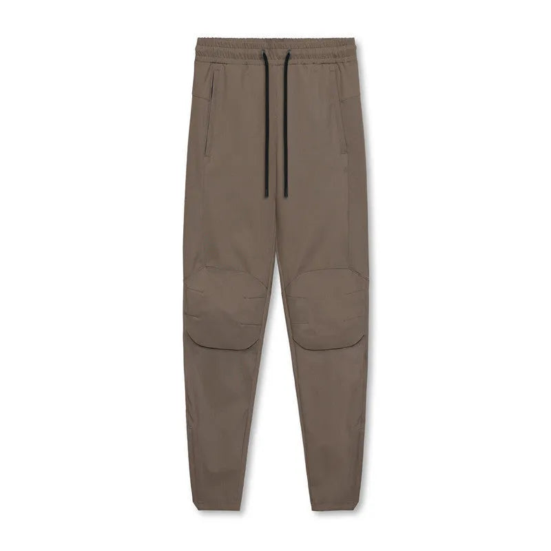 Men's grey ankle-tied fitness trousers with loose casual cut for exercise