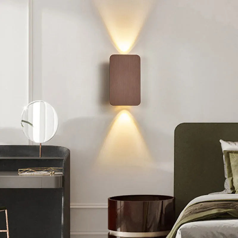 Minimalist Nordic style LED wall lamp in black finish mounted on wall showing adjustable light feature