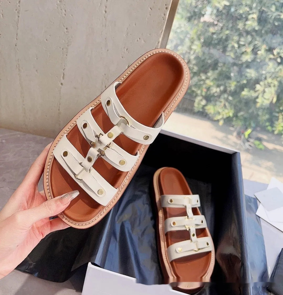 Women's white retro Roman-style sandal slippers with patent leather straps and sheepskin lining.