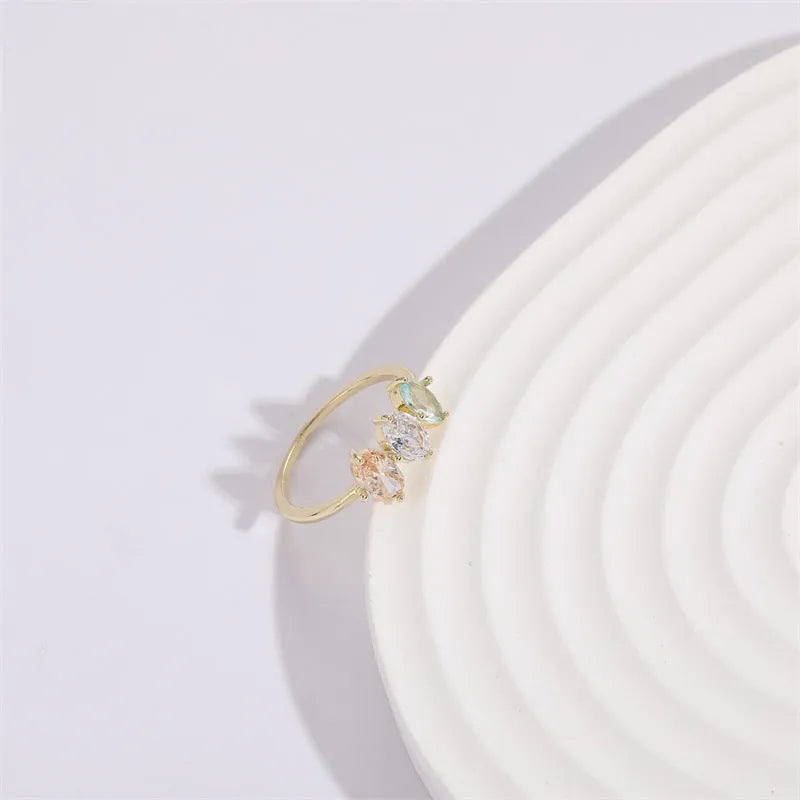 Mother's Day birthstone ring with triangle horse eye design and tricolor zircon stones in 14K gold plate.