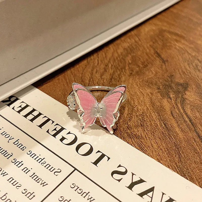 Copper Chinese butterfly women's ring showing creative design with oil dripping treatment finish