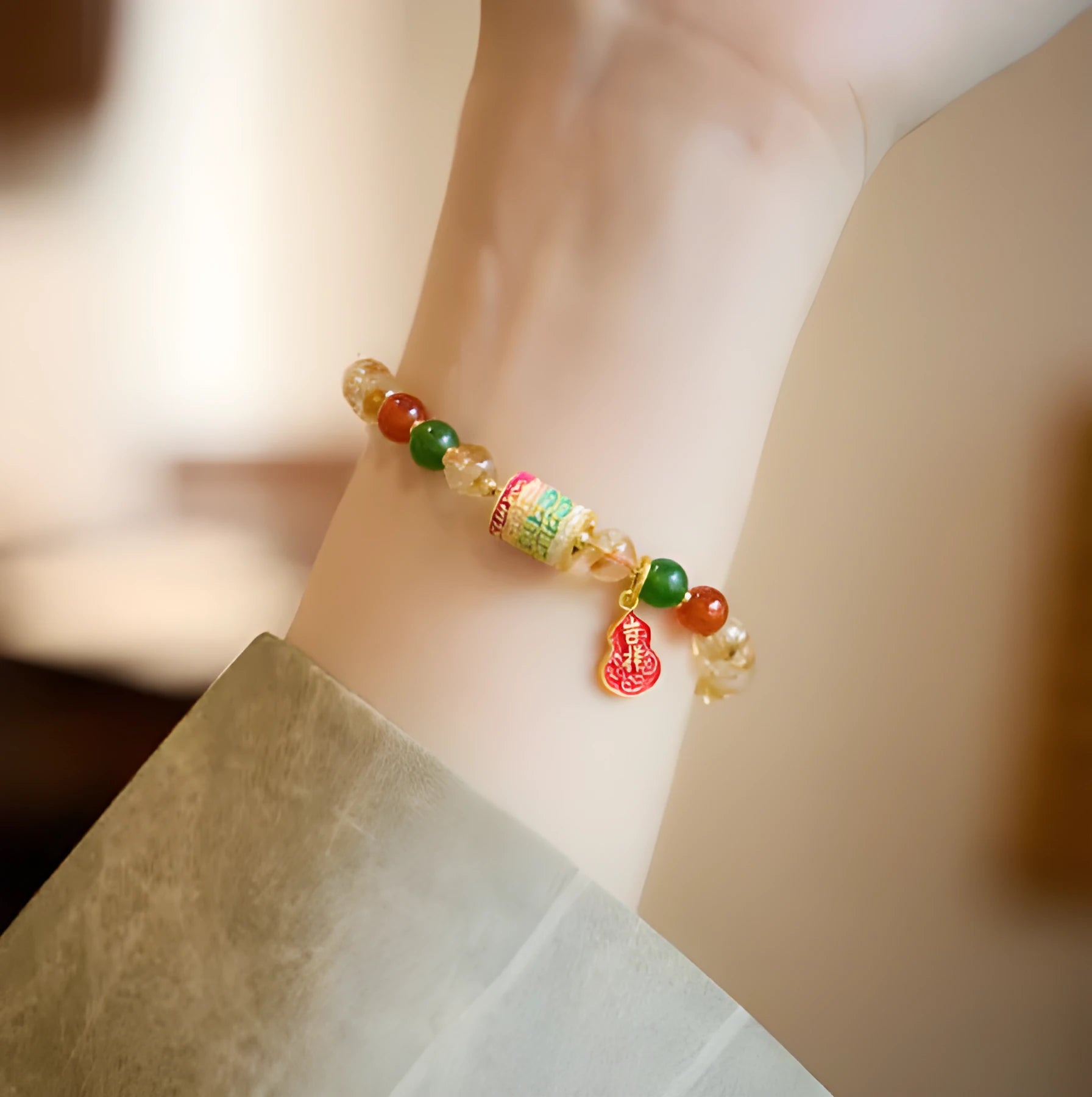 Hand-woven citrine five sutra bracelet with 6mm crystal beads on wrist