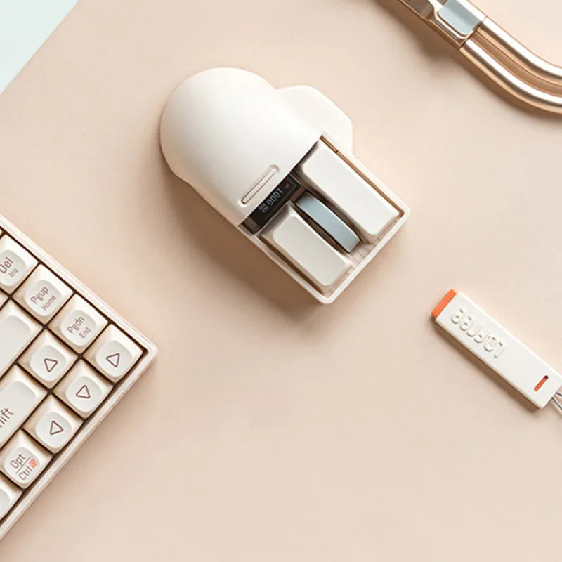 Xiaoqiao tofu colour wireless mouse with ergonomic design showing DPI adjustment button and scroll wheel