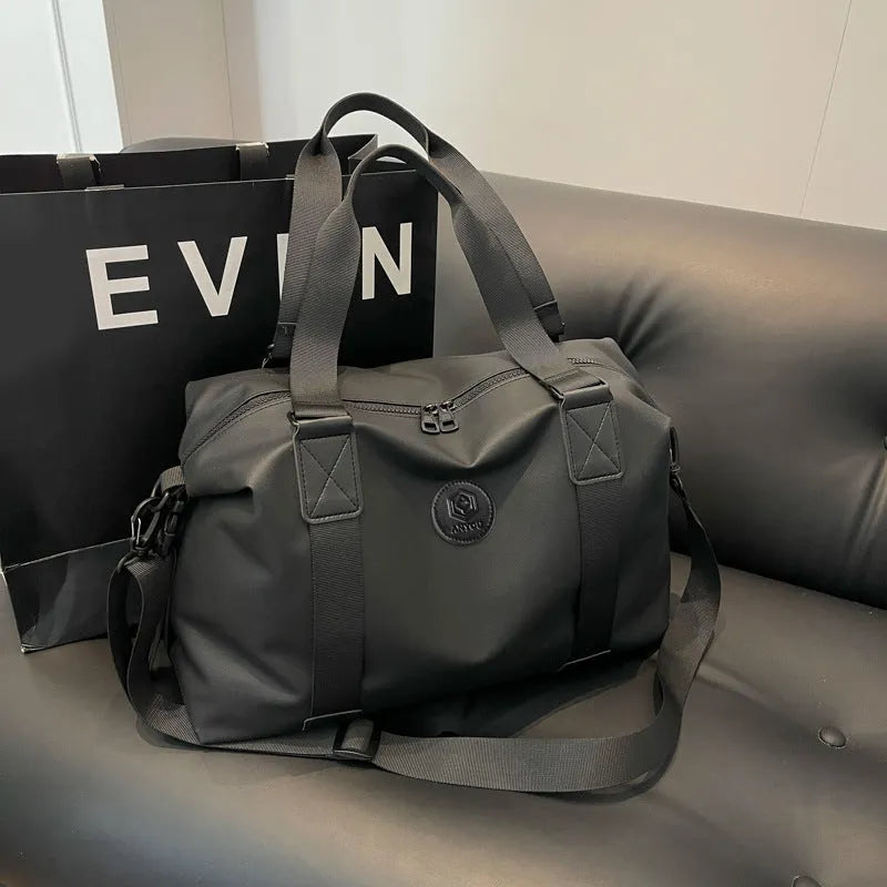 Large waterproof Oxford cloth travel bag in solid colour with 36-55L capacity for short-distance leisure travel