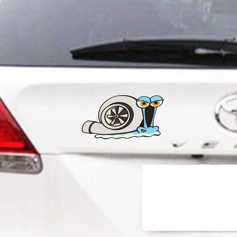 White reflective car sticker with a cartoon snail design, measuring 12 by 8 cm.