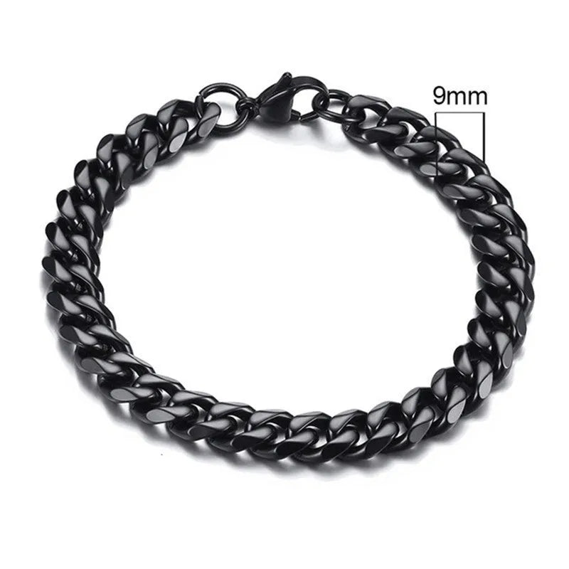 Six-sided geometric Cuban link metal bracelet in gold, black, and steel colour finishes.