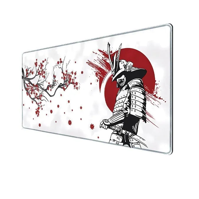 Japanese samurai design cloth gaming mouse pad on a desk, showing non-slip base and thermal transfer print detail.