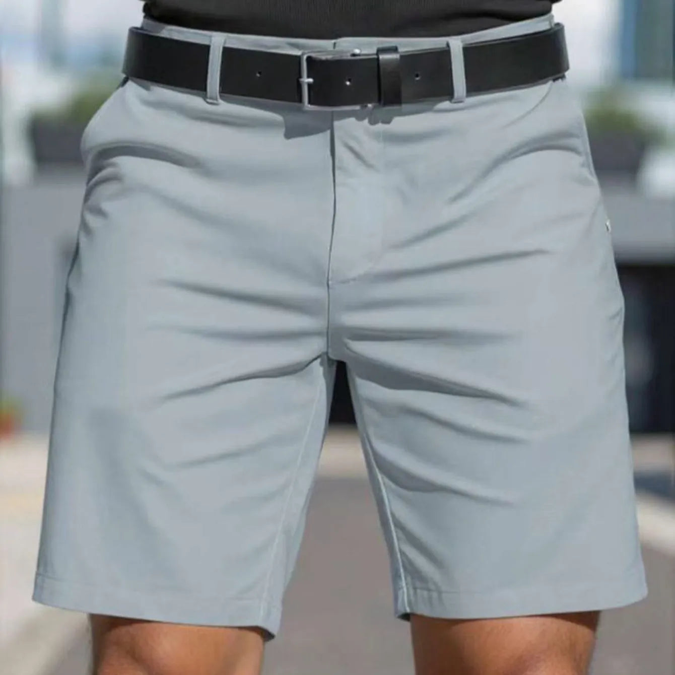 Men's solid colour straight-cut elastic fifth pants in light grey on a hanger.