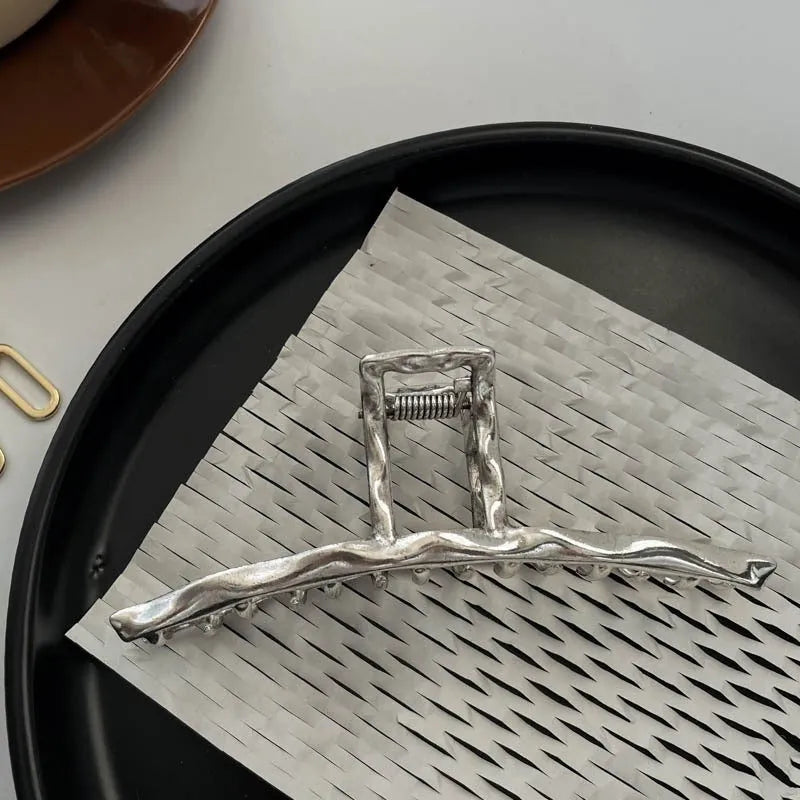 Silver metal hair barrette claw clip with electroplated finish and decorative design