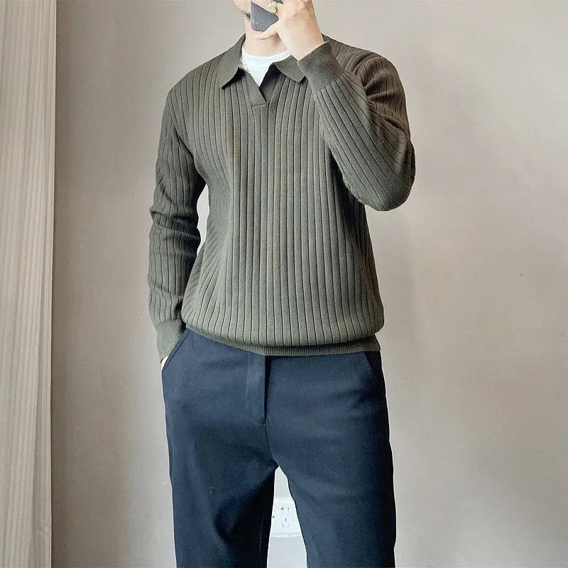 Man wearing a loose-fit Army Green knitted pullover sweater with long sleeves.