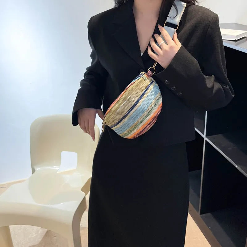 Blue woven straw beach bag with shell shape and single shoulder strap