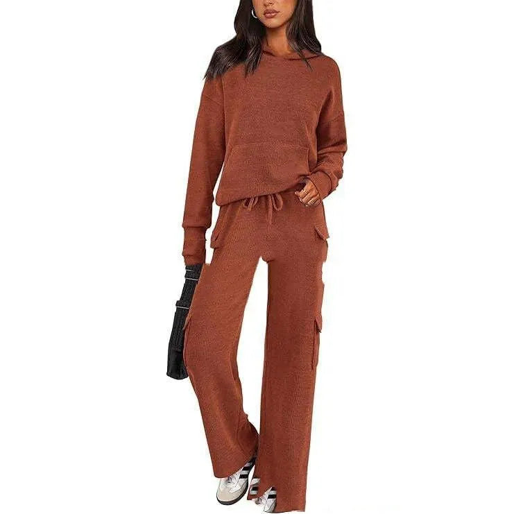 Women's polyester leisure sports suit set showing long sleeve top and matching trousers in multiple colour options