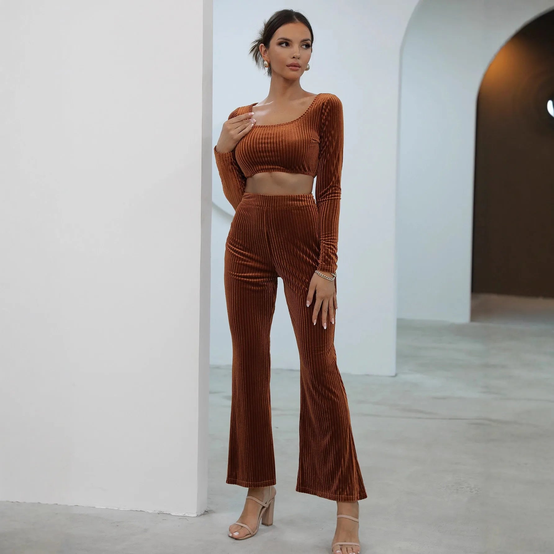 Caramel coloured long sleeve sweater and trousers set shown together