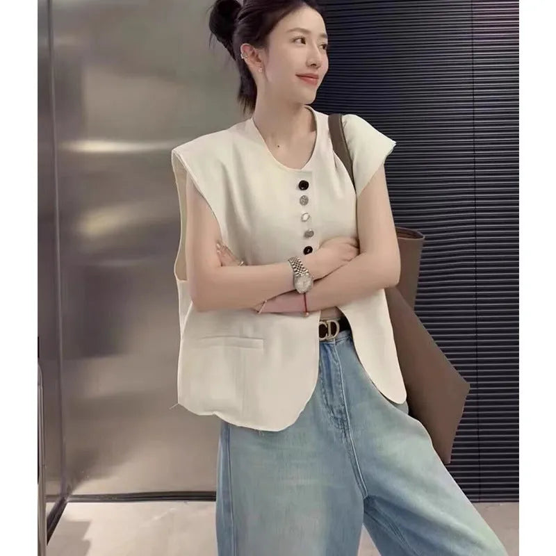 Women's loose fit polyester vest with pocket in milky white or black, 40cm short length