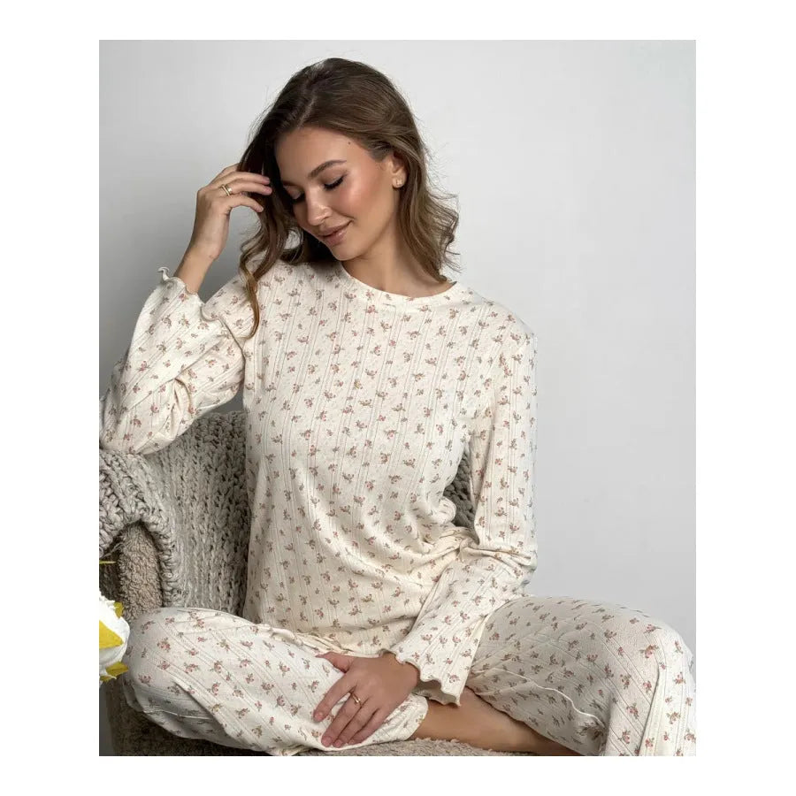 White floral print women's lounge set with bell sleeve top and wide leg trousers