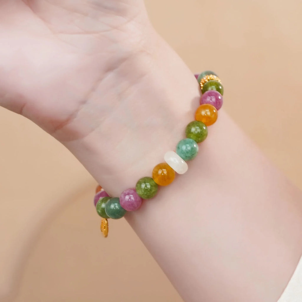 Women's tourmaline half bracelet with rainbow electroplated colour accents on natural stone beads
