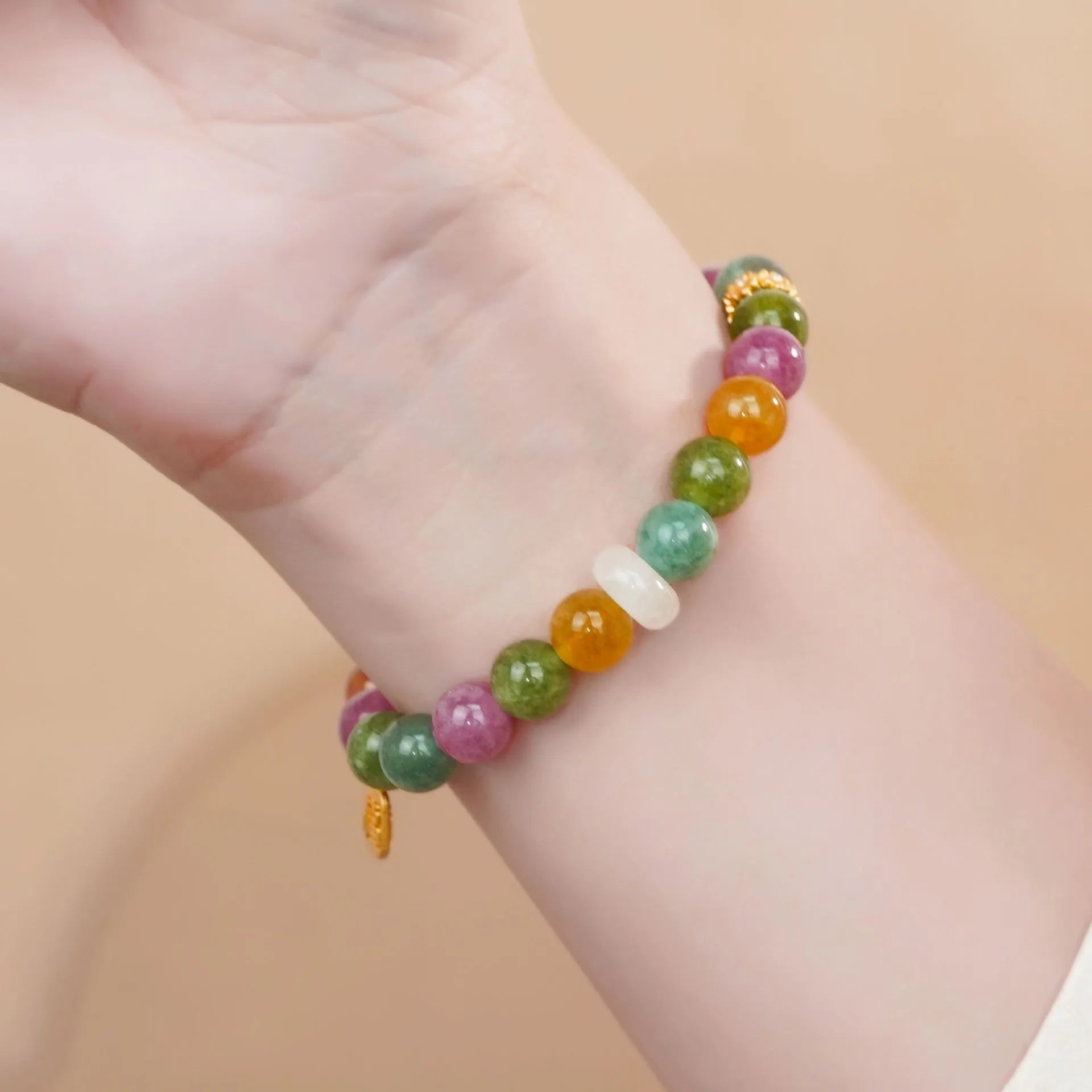 Women's tourmaline half bracelet with rainbow electroplated colour accents on natural stone beads