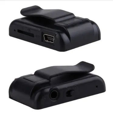 Black plastic clip MP3 player with TF card slot and mini USB port on a plain background