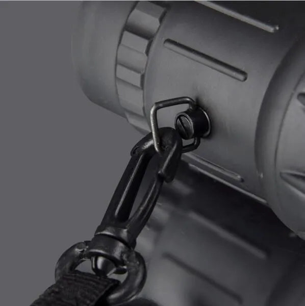 Black 16x52 high-power monocular with 52mm objective lens and green film coating
