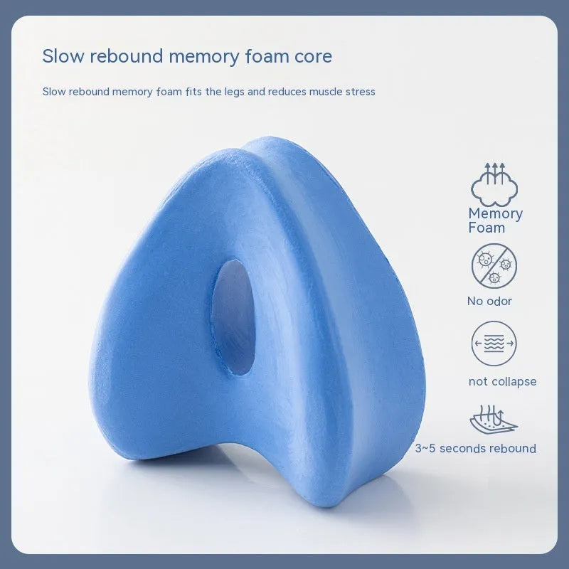 Love heart-shaped dark blue memory foam leg pillow for knee support.